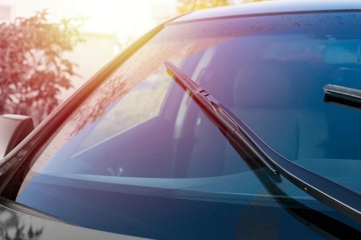 Transparent thermal insulation paint for automotive glass